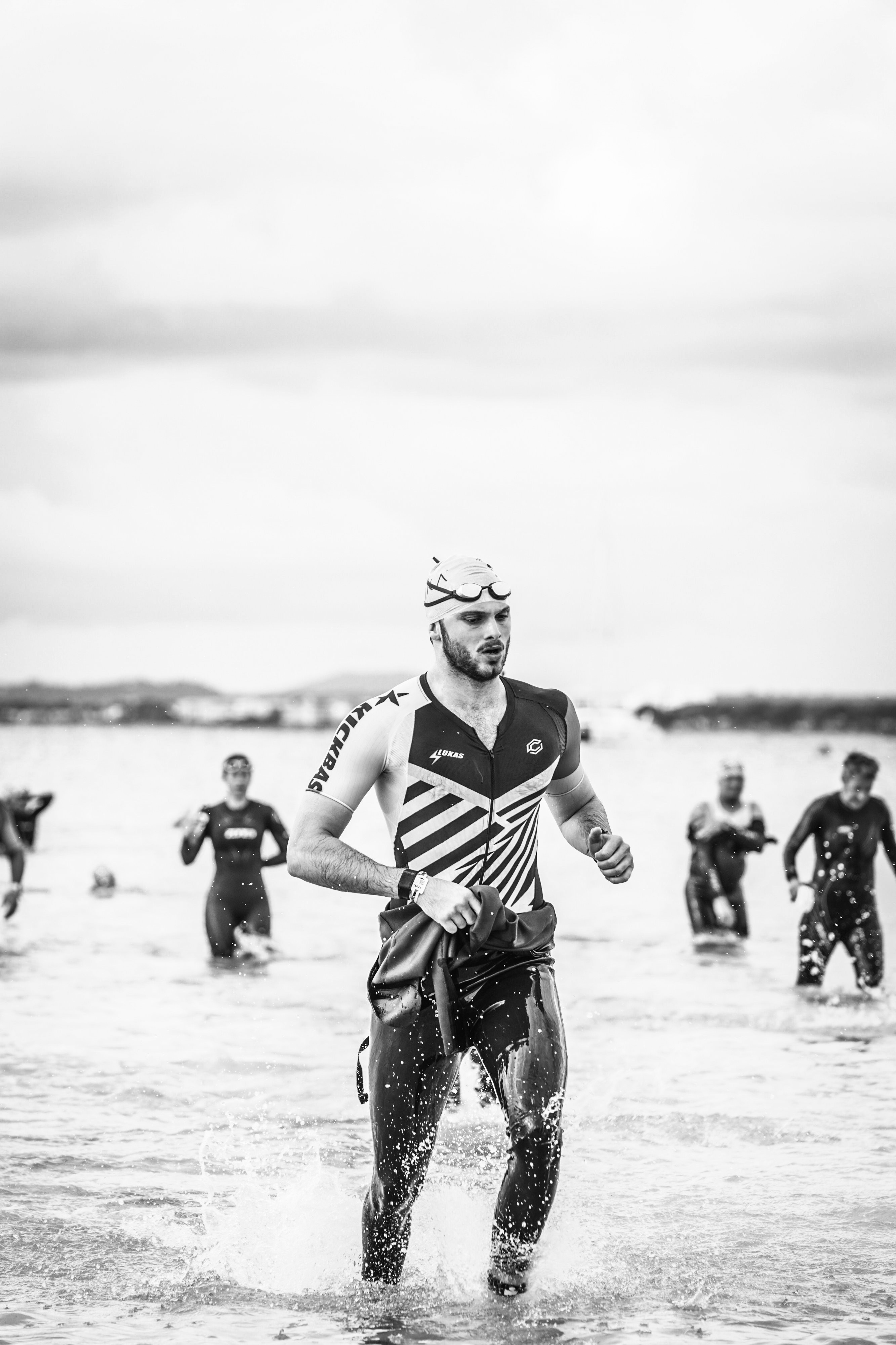 Lukas exiting the water at a triathlon